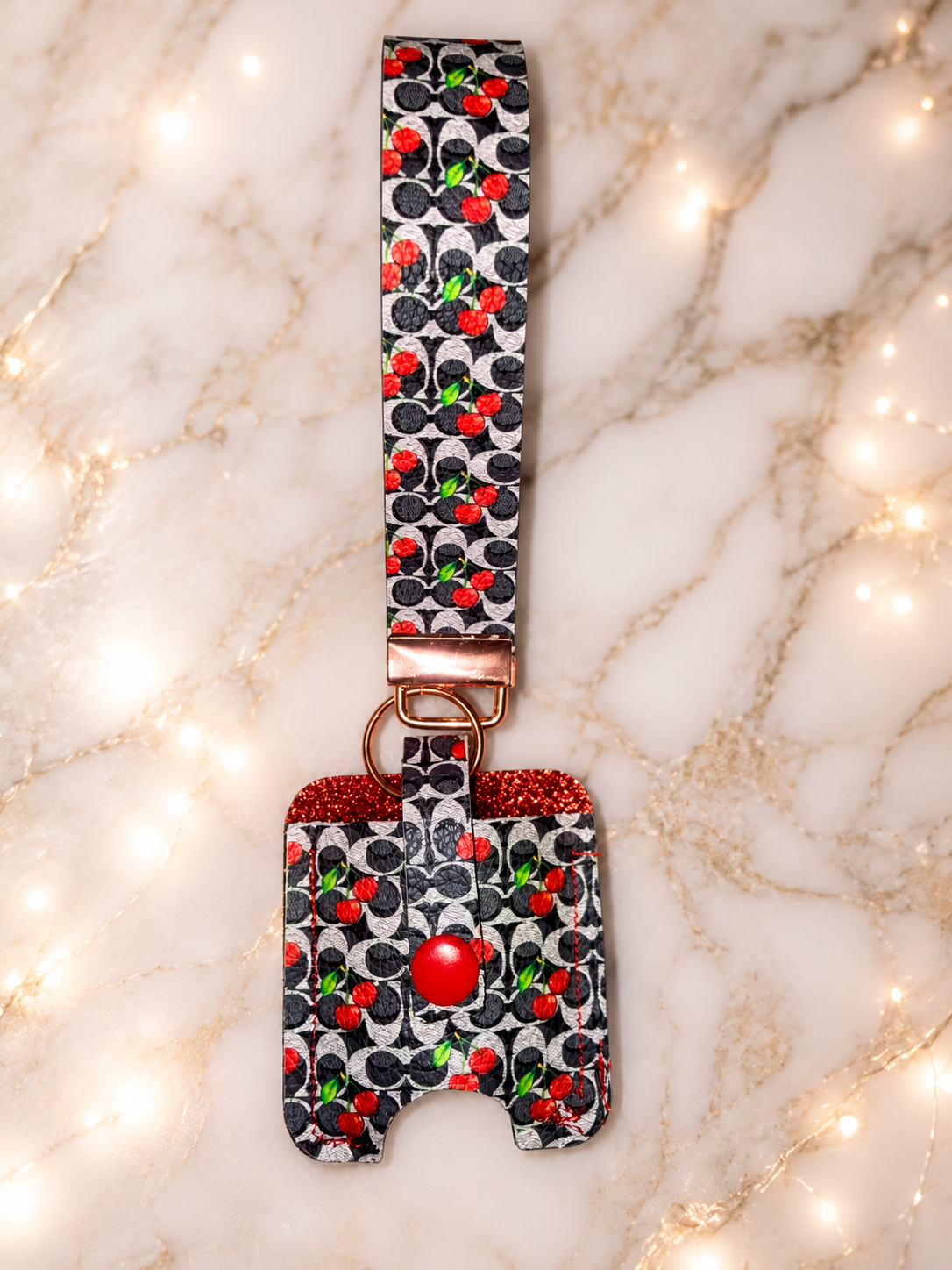 Ms cherry keychain with hand sanitizer